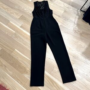 BCBGeneration Jumpsuit with lace detailing and pockets! Black, size 0